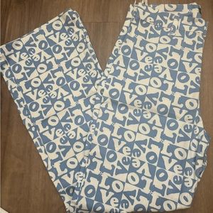 Blue and white love pants with a high waisted feature and flare legs